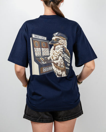 Navy t-shirt with a graphic of a bird and slot machine on the back, worn by a person and with the words "Brickie's Laptop".