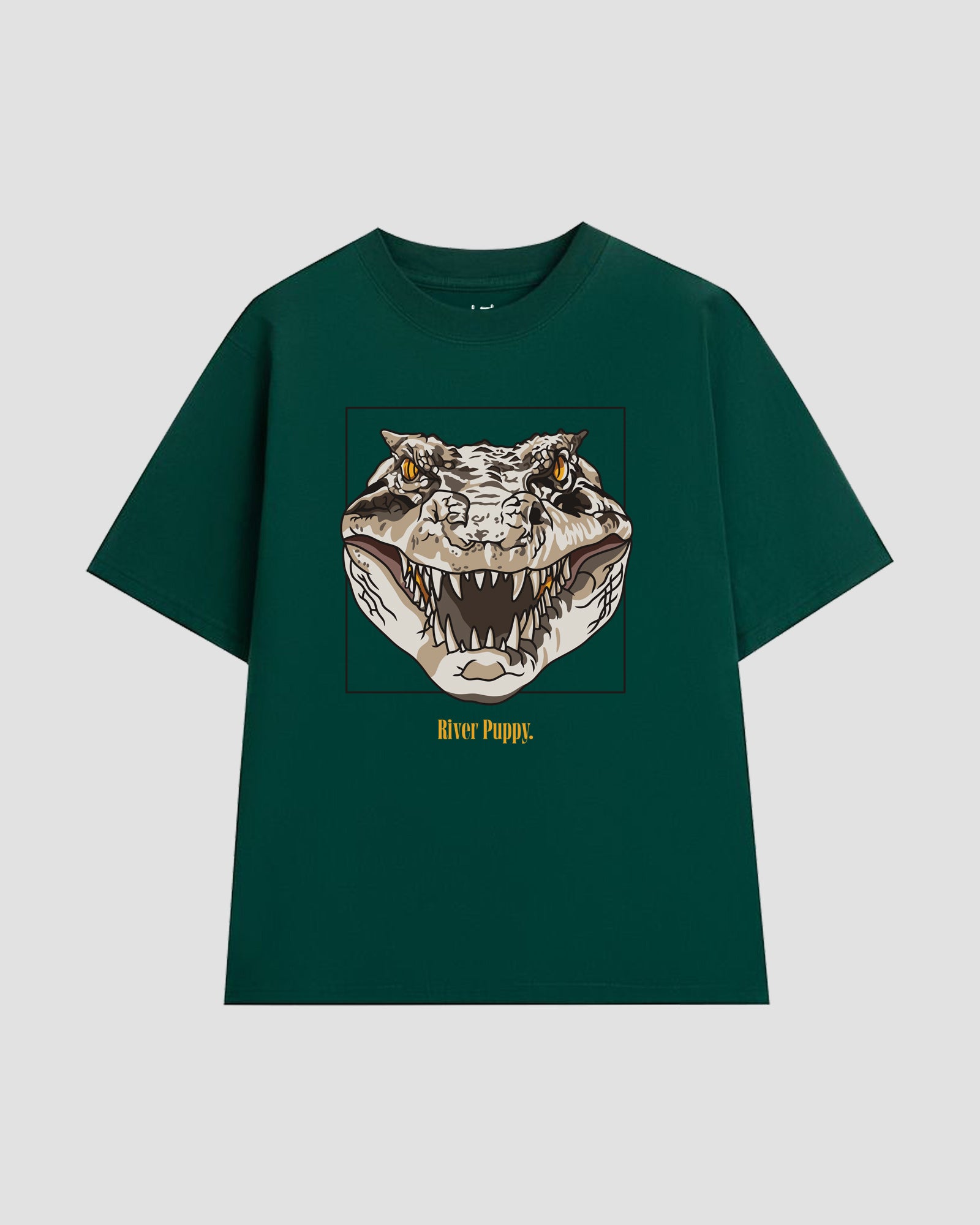 Green t-shirt with a crocodile graphic and 'River Puppy' text against a light grey background.