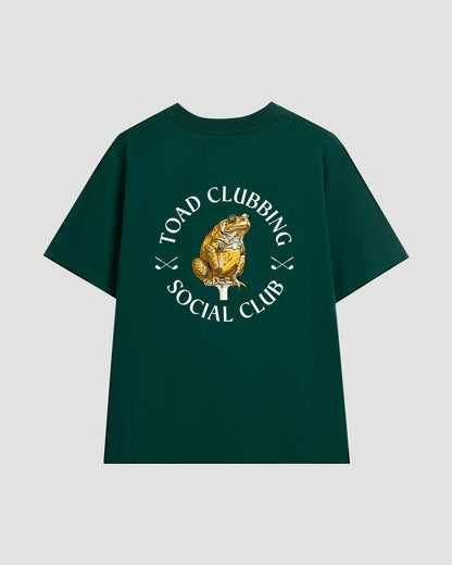 Unisex dark green t-shirt with a back print of the "Toad Clubbing Social Club" graphic —featuring a cane toad sitting on top of a golf tee with a bullseye in its right eye.