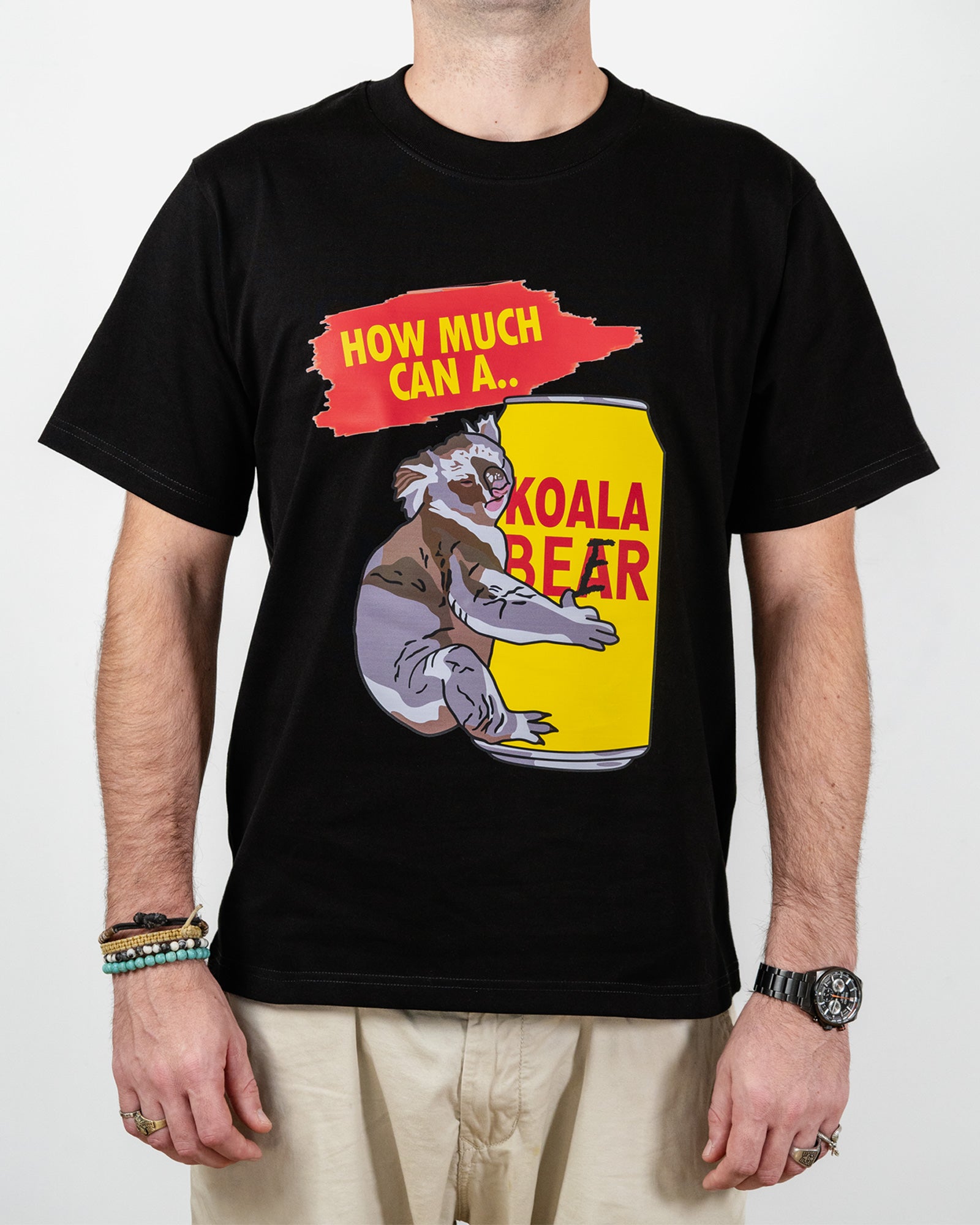 Black t-shirt with a graphic of a koala bear on a can and text 'How much can a... Koala Bear'.