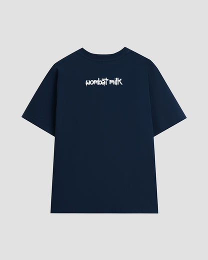 Navy unisex t-shirt featuring a white 'Wombat Milk' logo graphic situated below the collar at the back of the t-shirt.